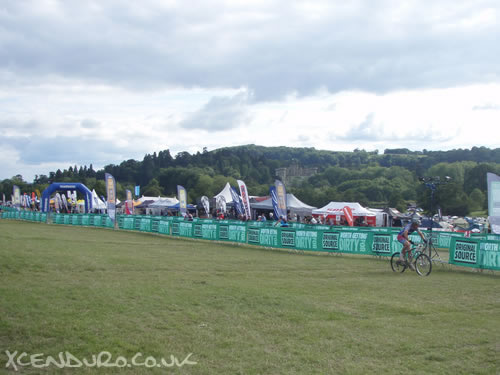 The Original Source Mountain Mayhem start/finish straight, Eastnor Castle in the distance.  The trade stands extended for another couple of hundred yards off to the right and ran the full length of the side the picture was taken on...a big event!
